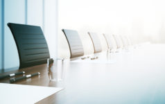 empty chairs in a boardroom
