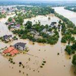 Aerial view of flooded houses with dirty water of Dnister river in Halych town, western Ukraine.
