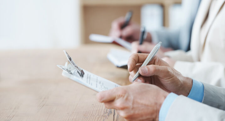 Review of EU shareholder rights law must end national fragmentation, say stakeholders Cropped shot of three coworkers sitting at a table and taking notes