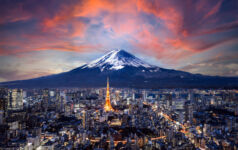 FinCity.Tokyo on building a finance hub for the global green transition Mt. Fuji in the background of the Tokyo skyline.