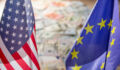 US Dollar and Euro on flags of the United States and European Union.