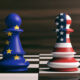EU to ‘exchange views’ with US on due diligence, deforestation rules USA and EU cooperation concept. US America and European Union flags on chess pawns soldiers on a chessboard. 3d illustration