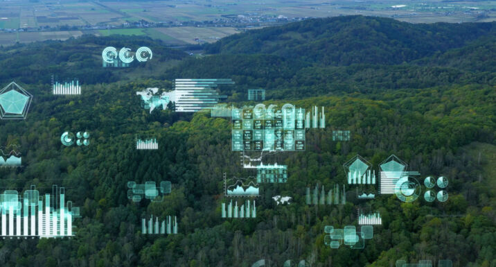 Image of a forest with technology symbols over it.