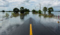 The long road ahead: Investors grapple with physical climate risk assessment A partially flooded road