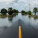 The long road ahead: Investors grapple with physical climate risk assessment A partially flooded road