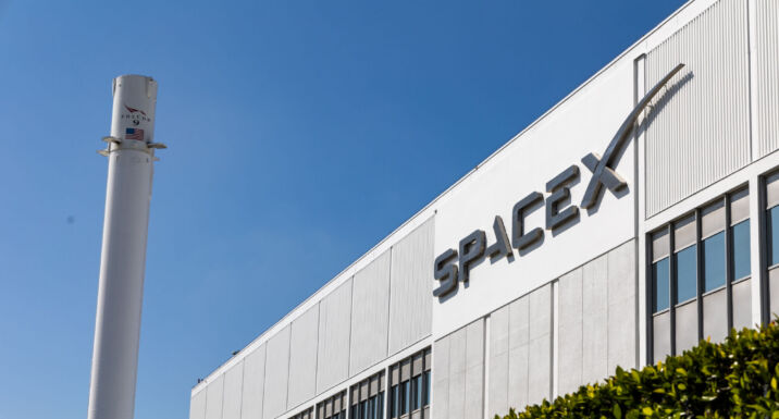 The Headquarters of SpaceX in Hawthorne, California, with a Falcon 9 booster in March 2024.
