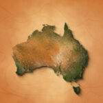 The video showcases an animation of a realistic map of Australia set against a brown vintage paper background. It utilizes a zooming effect, allowing viewers to closely examine the continent, revealing its geographical features and details.