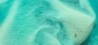 An aerial photo of sands covered by water