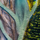 An aerial photo of a forest and rivers running alongside