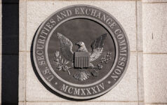 Federated Hermes and Travelers back SEC climate disclosure rescission SEC logo on building
