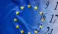 EU targets carbon pricing, chemicals and consumer rights in autumn agenda The flag of European Union with calendar of the month in the background