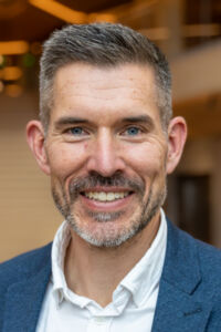 John E. Grova